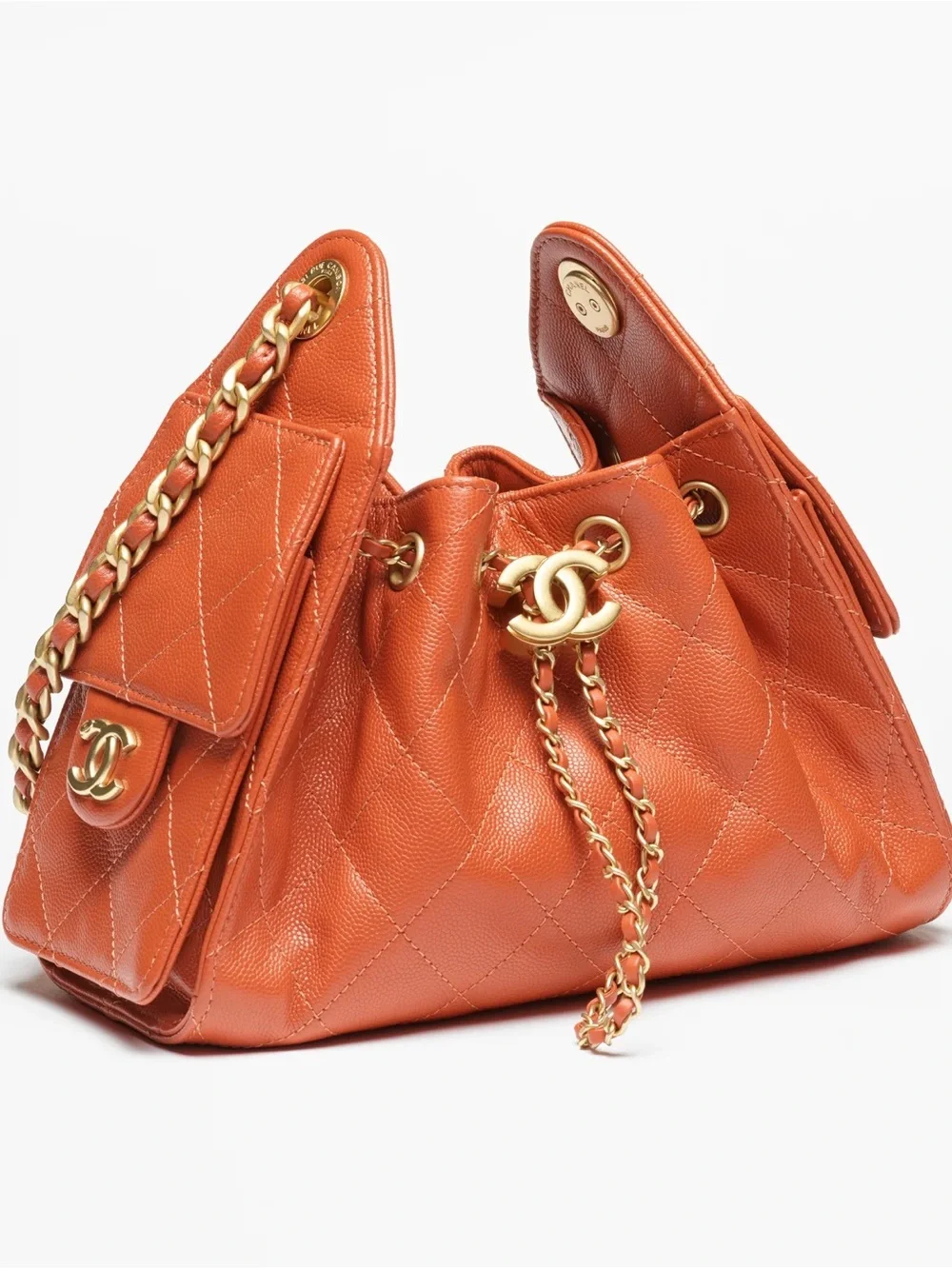 CHANEL Orange Quilted Drawstring Shoulder Bag with Gold Chain